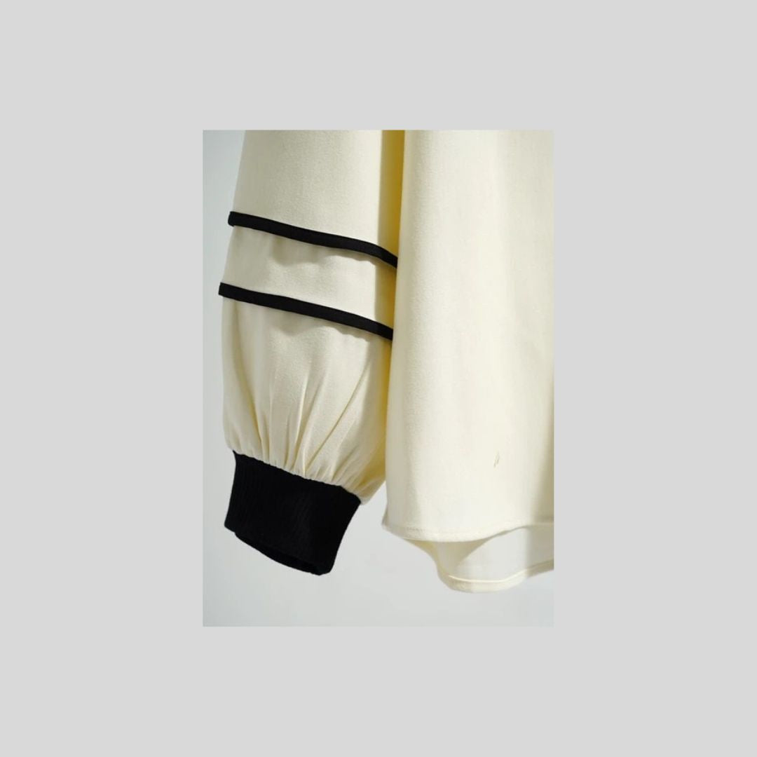 袖パイピングがかわいいブラウス